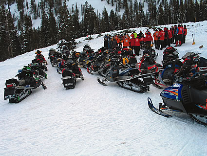 sledders on the trail