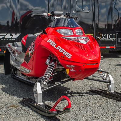 Picture of red 2016 Polaris IQ Race Sled. 