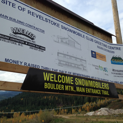 Billboard with details of the new Revelstoke Snowmobile Centre. 