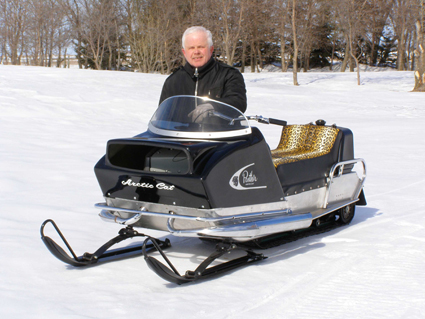 man sitting on a sled