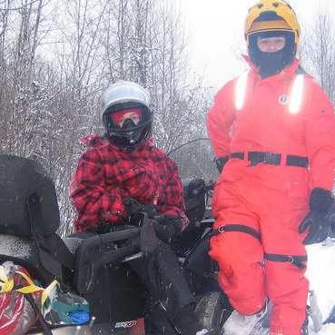 Heading out to explore the trails of the Elk Ridge area. Even a bad day snowmobiling is a good one for the Punshon family. Photo by Kevin Punshon