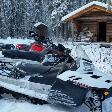 Take a break at one of the snowmobile club cabins, before hitting the trails again.