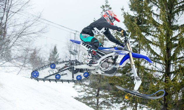 Savage Snowbike jumping. 