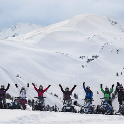 Picture of group of women snowmobilers. 