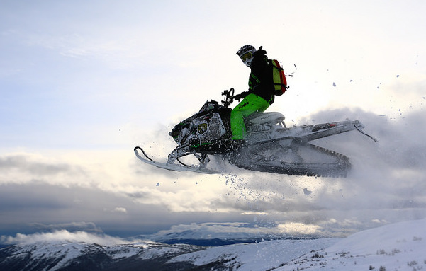 Curtis Hofsink touching sky on Microwave Mountain outside of Smithers, BC.