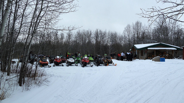 A group of sledders stopped for a lunch break at Bartles Cabin NW of Smoky Lake. 