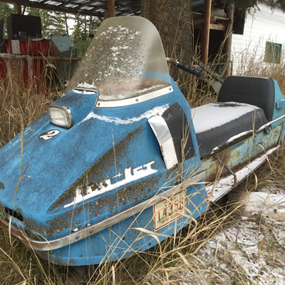 A vintage powder-blue Sno-Jet sled. 