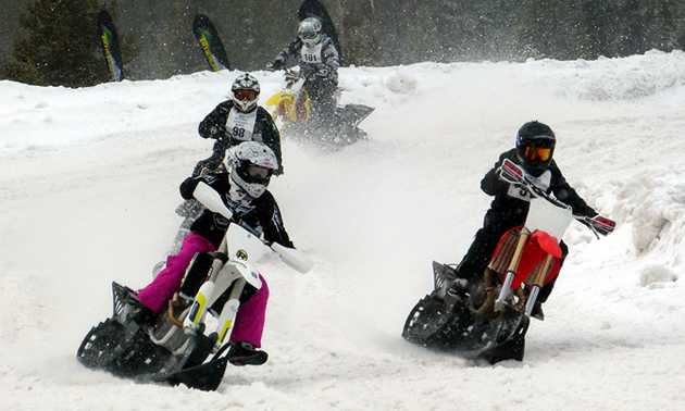 Two women snow bike racers going head to head in West Yellowstone. 