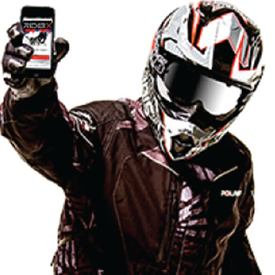 Picture of snowmobiler holding up a cell phone with the Snow Trails app on it. 