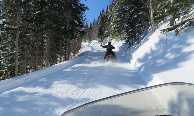 person riding on the snowmobile trails in St. Paul