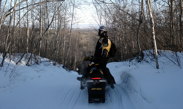 Sledder riding the trail in the Swan Valley. 