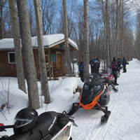 With lots of snowmobilers, this shows a busy day at the Big Bend Shelter. 