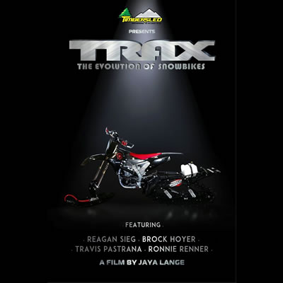 Trax film cover with Timbersled Snowbike in the spotlight. 