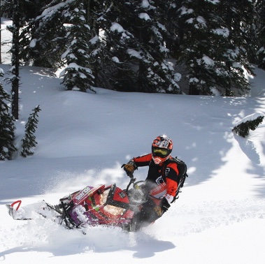 Trish Drinkle trying out her new shocks in the powder. 