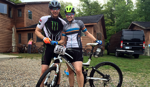 Tucker and Mandi Hibbert on a mountain bike. 