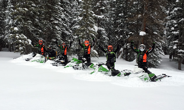 Team #68 Tucker Hibbert on sleds in the mountains. 