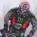 A man on a snowmobile.