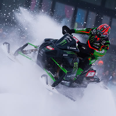 Tucker Hibbert on snowmobile. 