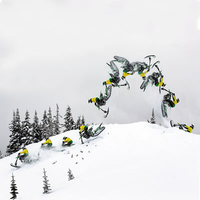 Brett Turcotte backflipping the Yeti Snow MX snow bike. 