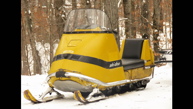 A vintage yellow Ski-Doo